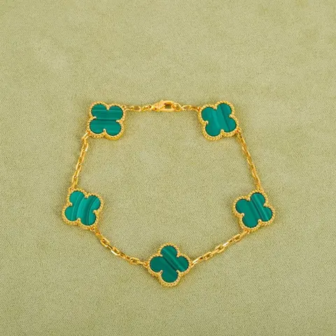 Gold-Tone Bracelet with Turquoise Clover-Shaped Links
