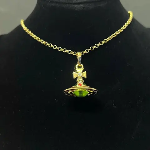 Gold UFO Pendant Necklace with Green Crystal and Cross Charm