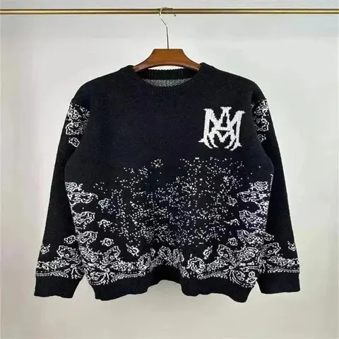 Black Knit Sweater with White 'M' Logo and Floral Pattern