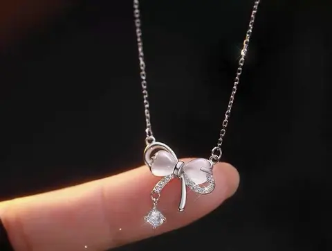 Silver Bow Pendant Necklace with Crystal Charm