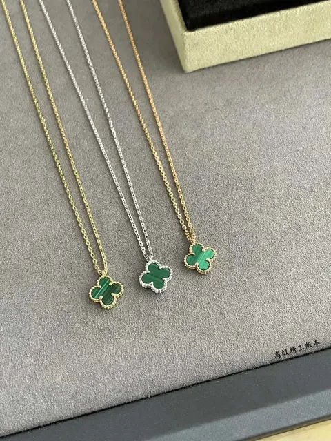 Four-Leaf Clover Pendant Necklaces in Gold and Silver