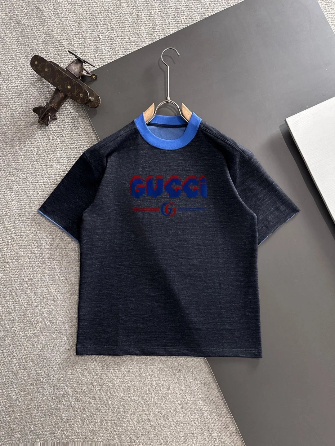 Gu*cci