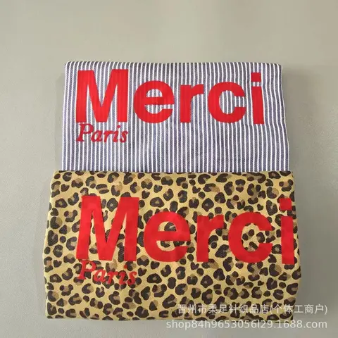 Merci Paris Striped and Leopard Print Towels