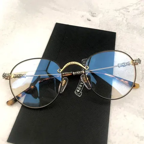 Gucci Round Frame Eyeglasses with Gold Accents