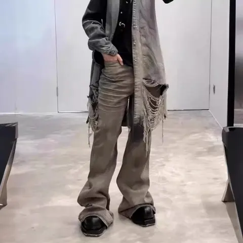 Distressed Denim Jacket with Frayed Details and Oversized Fit