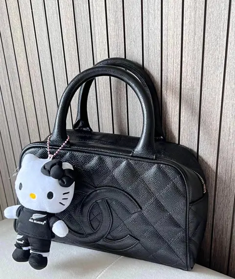 Chanel Quilted Black Leather Bowling Bag with Hello Kitty Charm