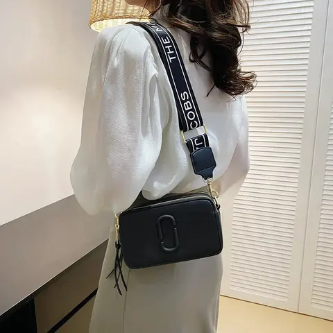 Black Crossbody Bag with 'THE COBS' Strap