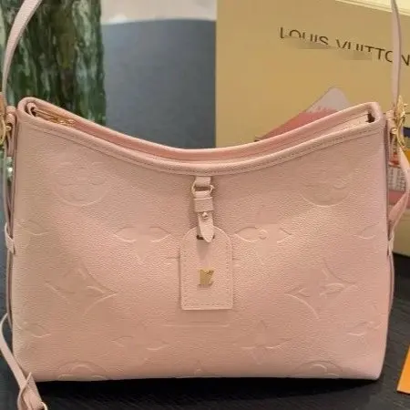 Louis Vuitton Pink Monogram Empreinte Leather Malletage Bag