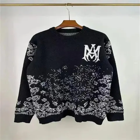 Black Knit Sweater with White 'M' Logo and Floral Pattern
