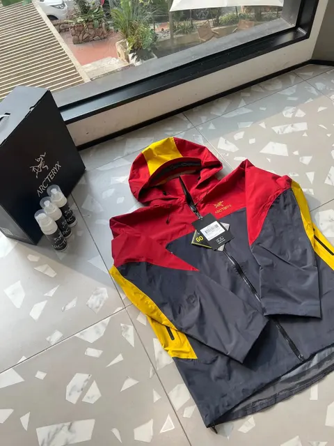Arc'teryx Red and Yellow Hooded Jacket