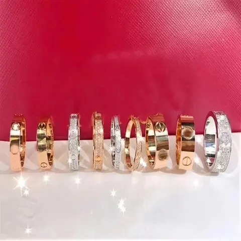 Collection of Rose Gold and Silver Tone Hinged Bangles with Crystal Accents