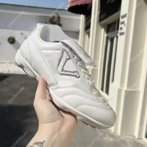 White Leather Sneakers with V-Logo Design