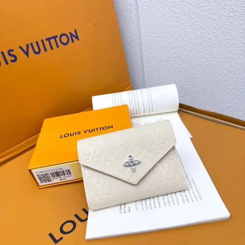 Louis Vuitton White Monogram Empreinte Wallet with Crystal Flower Clasp