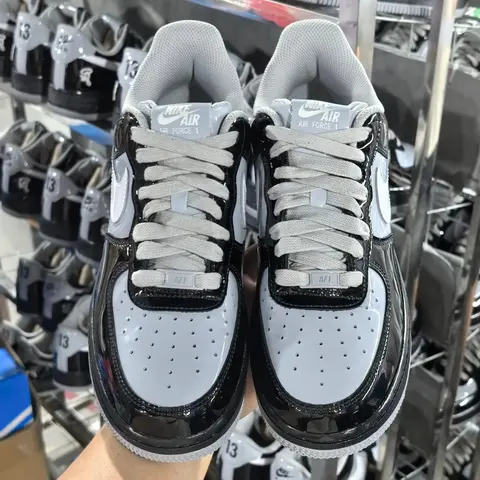 Nike Air Force 1 Low Black and White Patent Leather Sneakers