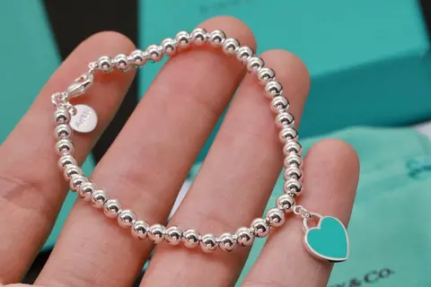 Tiffany & Co. Silver Beaded Bracelet with Turquoise Heart Charm