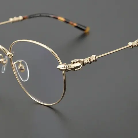 Gold Round Frame Eyeglasses with Decorative Hinges