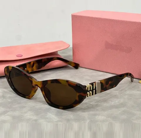 Miu Miu Tortoise Shell Cat-Eye Sunglasses
