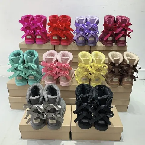 Colorful Bow-Adorned Fuzzy Winter Boots Collection