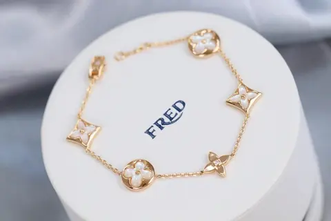 FRED Gold Bracelet with Flower Motifs