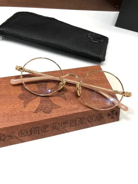 Gucci Round Frame Eyeglasses with Gold Accents