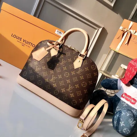 Louis Vuitton Alma BB Monogram Canvas Handbag