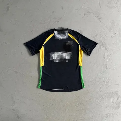 Black, Yellow, and Green Performance T-Shirt with Abstract Print