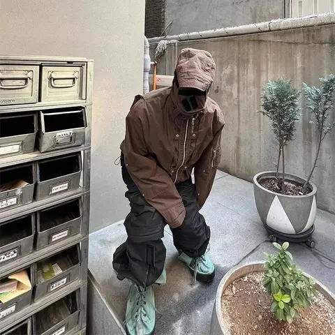 Brown Hooded Jacket with Black Cargo Pants and Mint Sneakers