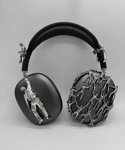 Artistic Over-Ear Headphones with Human Figure Sculptures