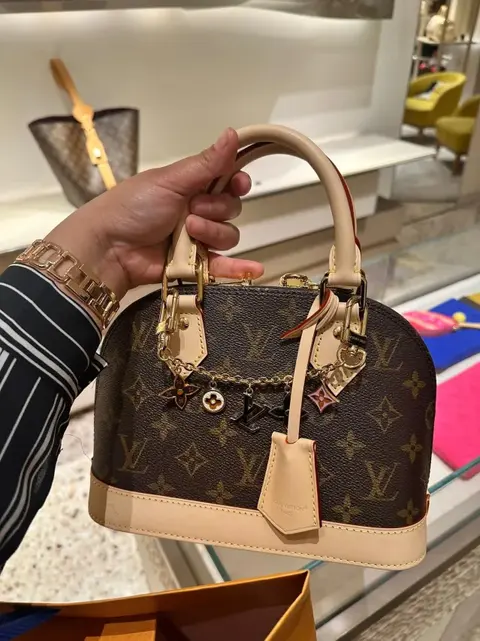 Louis Vuitton Alma PM Handbag