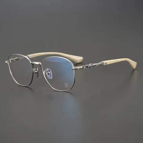 Silver Rimmed Eyeglasses with Ivory-Toned Temple Arms and Ornate detailing