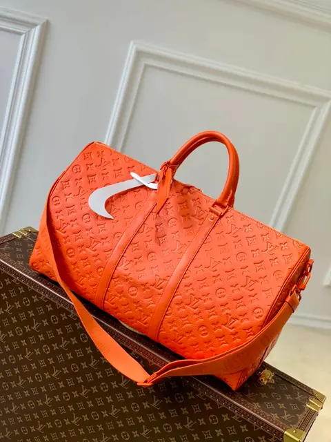 Louis Vuitton Monogram Orange Keepall Duffle Bag