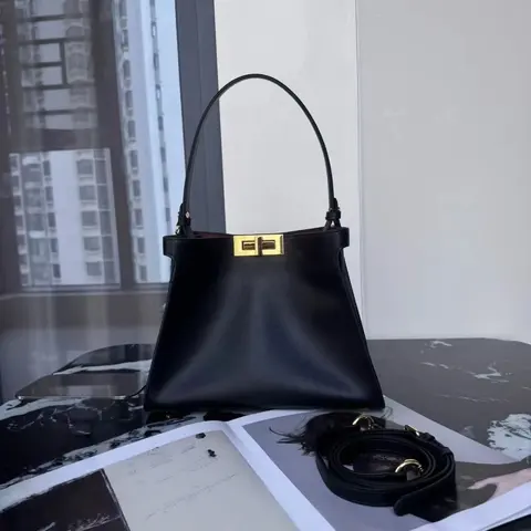 Black Leather Handbag with Gold Clasp
