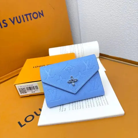Louis Vuitton Blue Monogram Embossed Wallet with Flower Clasp