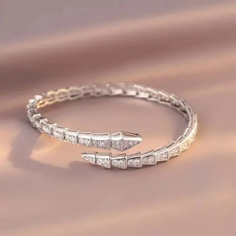 Snake-shaped bracelet with full diamond accents, luxury snake bone design
