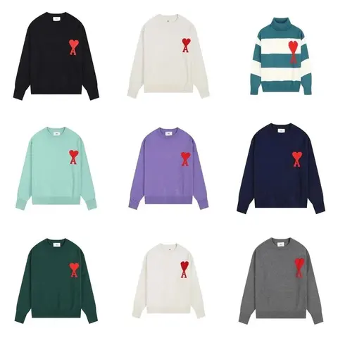 Comme des Garçons Heart Logo Sweaters Collection