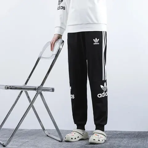 Adidas Black Track Pants with White Stripes and Logo