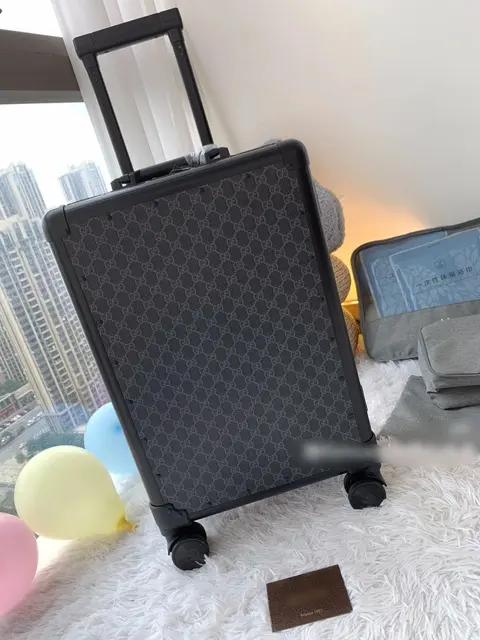 Gucci Monogram Rolling Luggage