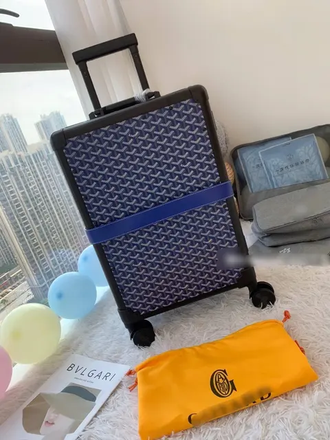 Kangol Patterned Rolling Suitcase with Blue Strap