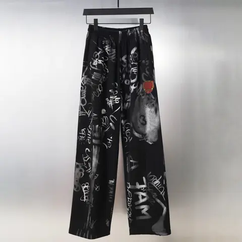 Black Graffiti Print Pants with Red Patch