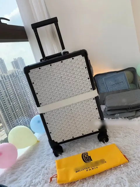 Malletier Paris Luggage Set with Monogram Pattern and Travel Accessories