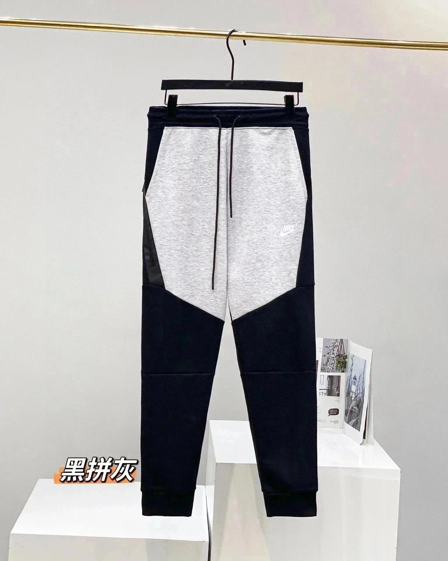 黑灰拼接裤子