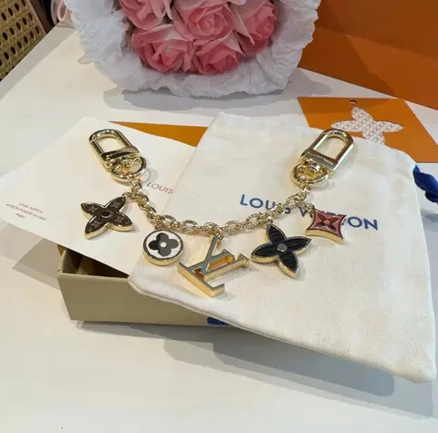 Louis Vuitton Charm Bracelet with Monogram and LV Charms