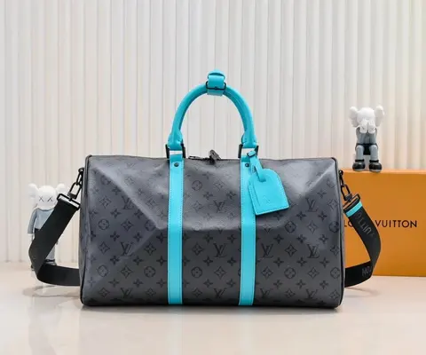 Louis Vuitton Keepall Bag with Monogram Pattern and Turquoise Accents