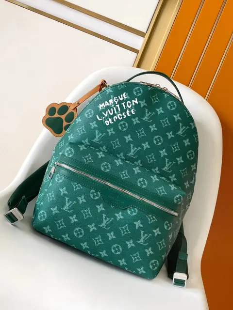 Louis Vuitton Green Monogram Backpack with Paw Charm