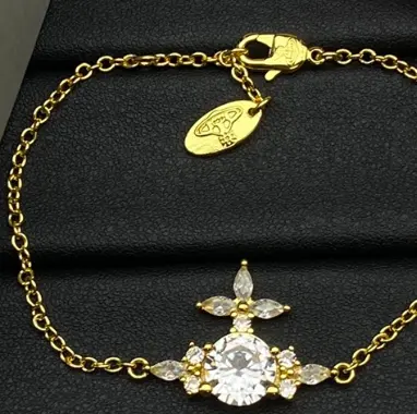Gold Chain Bracelet with Crystal Flower Pendant