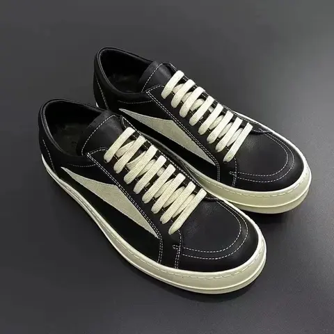 Black and White Low-Top Sneakers with Contrast Stitching