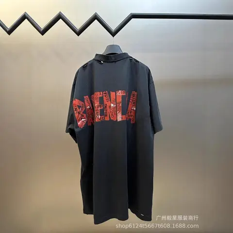 Black Oversized T-Shirt with Red 'CAUTION' Tape Print