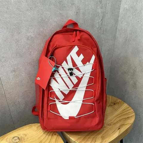 Nike Red Backpack with White Swoosh and Lacing Design