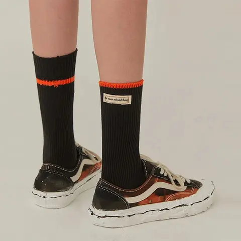 Black Ribbed Socks with Orange Trim and Text Label