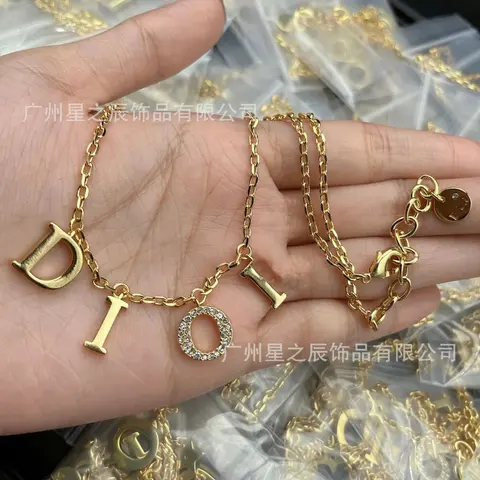 Gold DIO Letter Charm Necklace